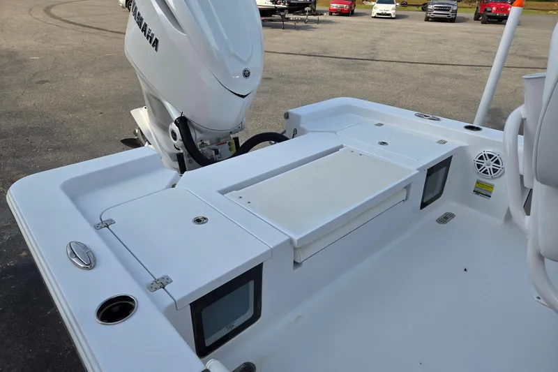 Slide: The Image of 2026 Sportsman Masters 247OE Bay Boat with Yamaha engine, featuring spacious deck layout. - 13