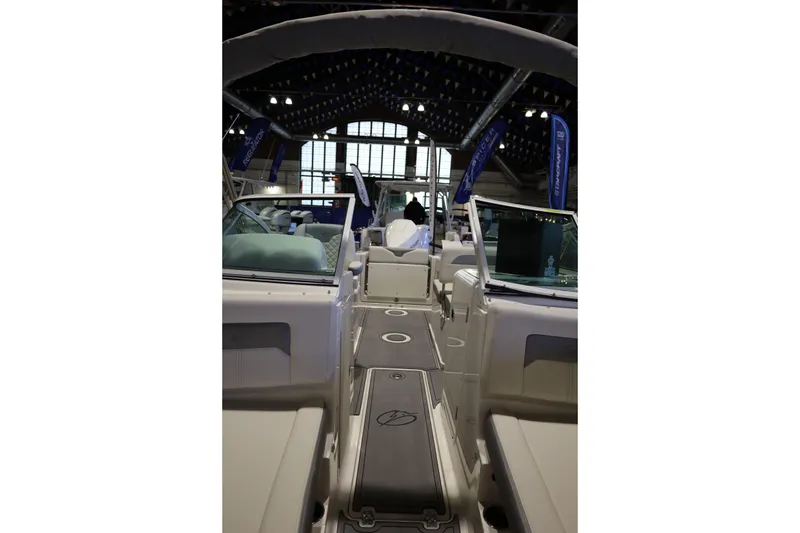 Slide: The Image of 2026 Sailfish 236 DC boat interior at an indoor exhibition. - 22