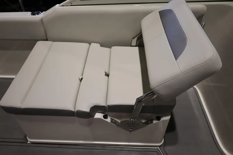 Slide: The Image of 2026 Sailfish 236 DC boat seat with adjustable backrest in light gray upholstery. - 32