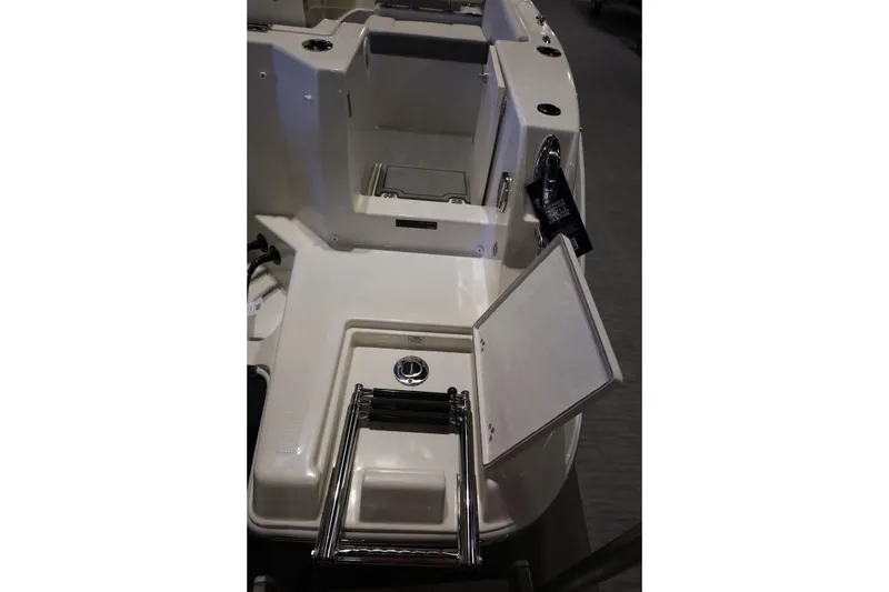 Slide: The Image of 2026 Sailfish 236 DC boat interior with open hatch and ladder. - 36