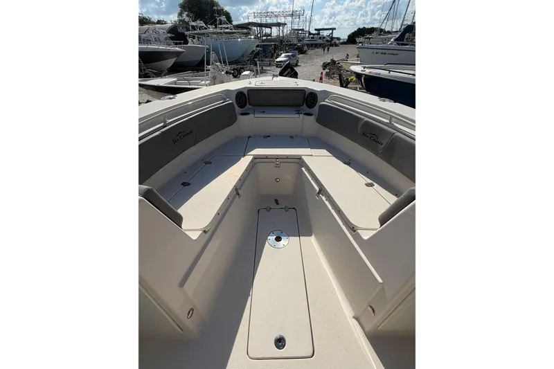 Slide: The Image of 2023 Sea Chaser 27 HFC CC boat interior with seating and storage compartments. - 17