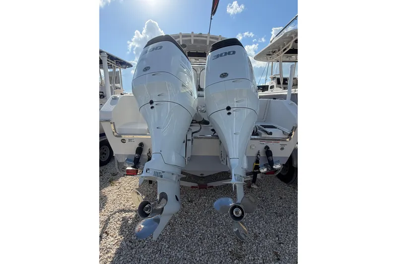 Slide: The Image of 2023 Sea Chaser 27 HFC CC boat with dual 300 horsepower outboard motors. - 5