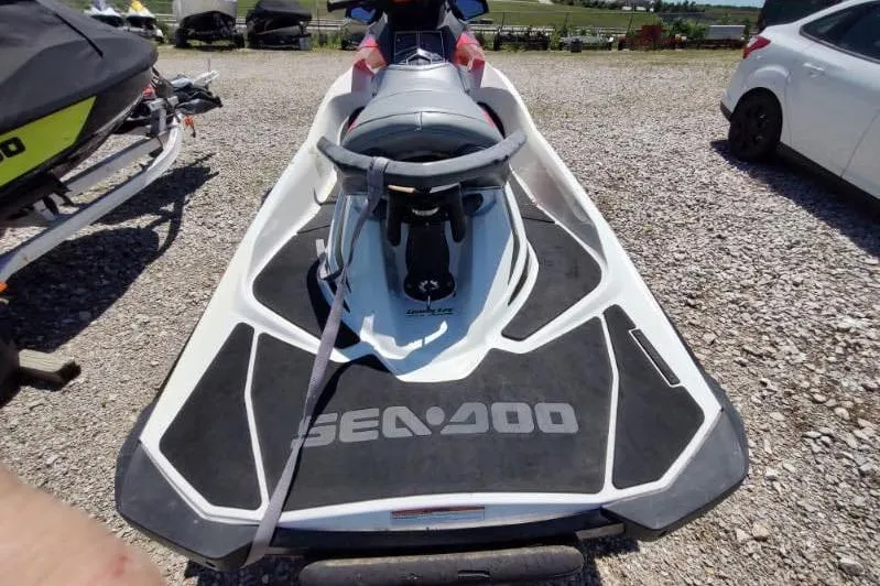 Slide: The Image of 2015 Sea-Doo Wake Pro 215 jet ski on gravel lot, rear view. - 3