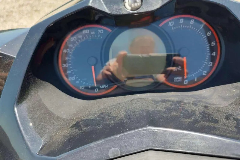 Slide: The Image of Dashboard of a 2015 Sea-Doo Wake Pro 215 showing speedometer and tachometer. - 4