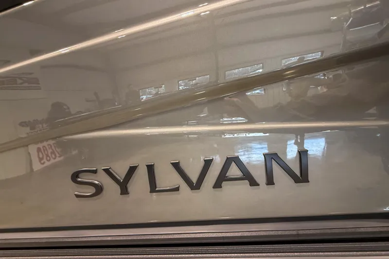 Slide: The Image of Sylvan L3 LZ DH 2026 model nameplate on a sleek boat exterior. - 3