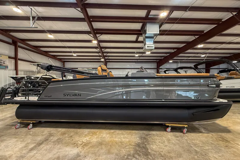 The Image of 2026 Sylvan L3 LZ DH pontoon boat in a showroom, side view. - 1