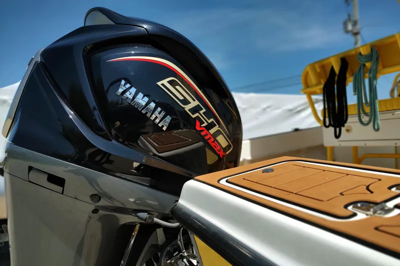 Slide: The Image of 2004 Angler 204 Center Console with Yamaha SHO VMAX outboard motor. - 2