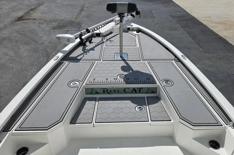 Slide: The Image of Bow of 2021 Avid 23 FS boat with fishing deck and trolling motor. - 19