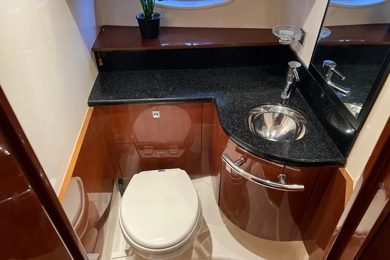 Slide: The Image of Luxurious bathroom in 2009 Searay 470 Sundancer yacht with sleek fixtures and elegant design. - 22