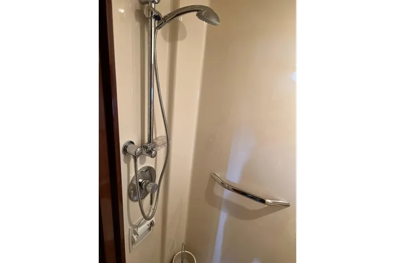 Slide: The Image of Shower area in 2009 Searay 470 Sundancer yacht with chrome fixtures. - 23