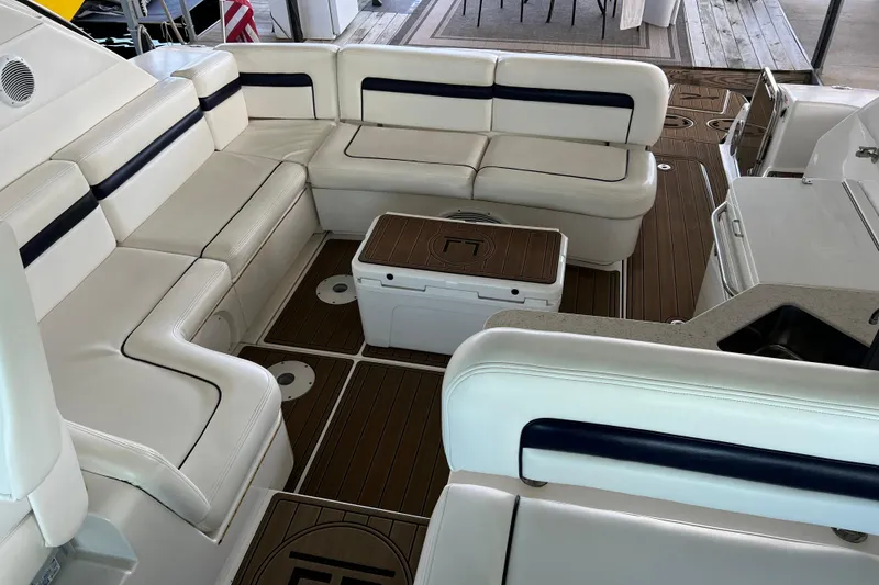 Slide: The Image of Luxurious seating area on a 2009 Searay 470 Sundancer yacht with elegant wood flooring. - 27