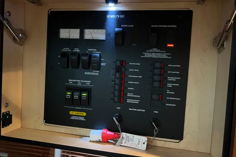 Slide: The Image of Electrical control panel on a 2009 Searay 470 Sundancer yacht. - 33
