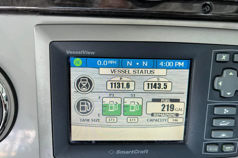 Slide: The Image of VesselView display on 2009 Searay 470 Sundancer showing fuel status and engine hours. - 34