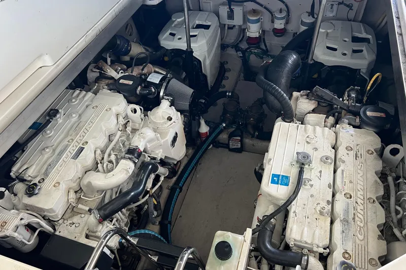 Slide: The Image of Engine room of 2009 Searay 470 Sundancer with Cummins engines visible. - 37
