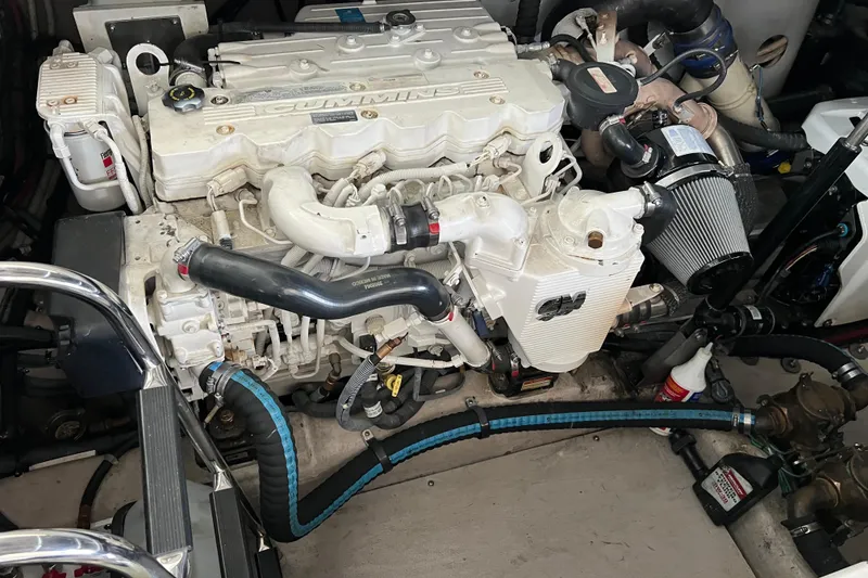 Slide: The Image of Engine compartment of a 2009 Searay 470 Sundancer with Cummins engine components. - 38