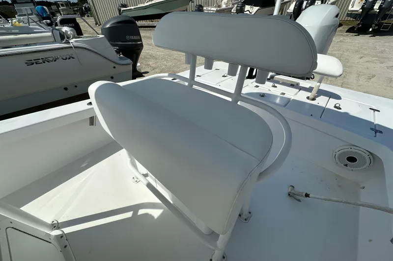 Slide: The Image of White seating on 2018 Intruder 23 boat deck, featuring clean design and sturdy construction. - 12