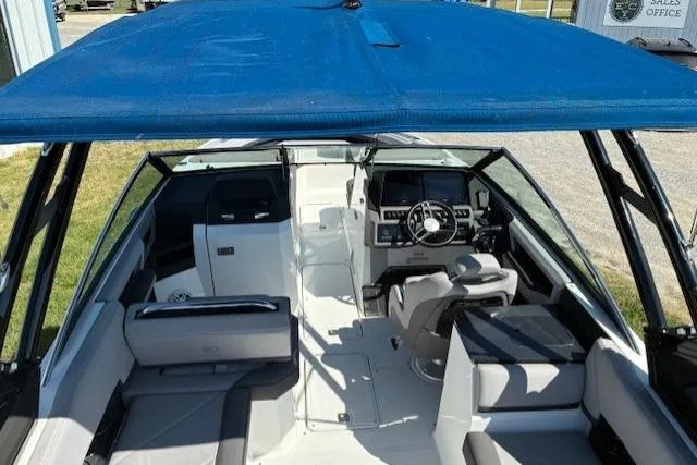 Slide: The Image of 2022 Cobalt R8 Outboard boat interior with gray seating and sleek design. - 5