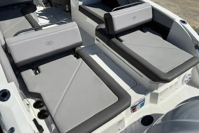 Slide: The Image of Interior of a 2022 Cobalt R8 Outboard boat with modern steering and seating. - 6