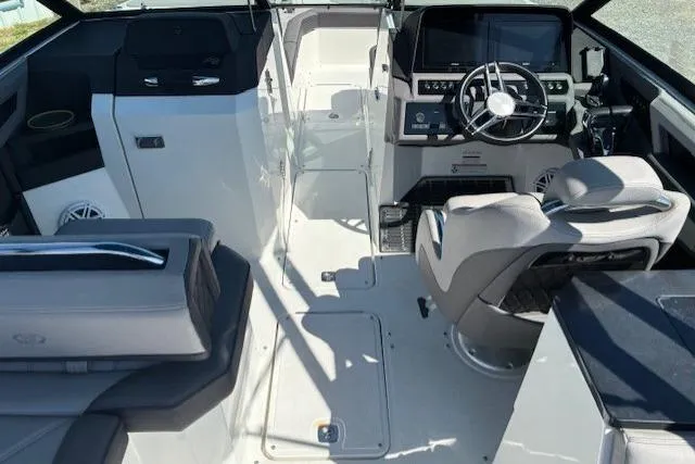 Slide: The Image of 2022 Cobalt R8 Outboard boat interior with gray seating and spacious layout. - 7