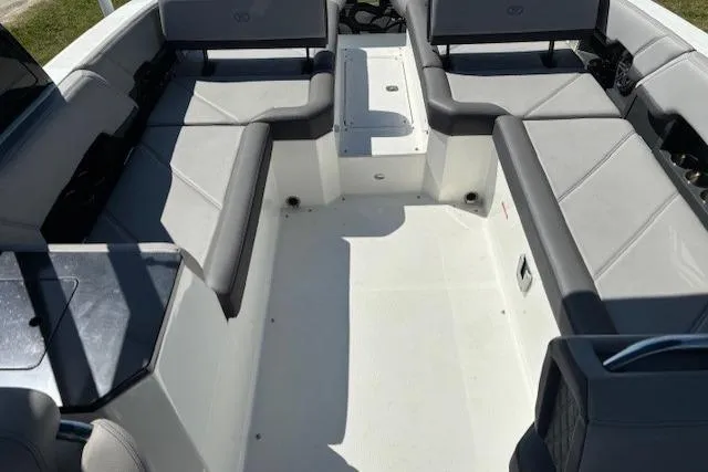 Slide: The Image of 2022 Cobalt R8 Outboard boat interior with spacious seating and modern design. - 8