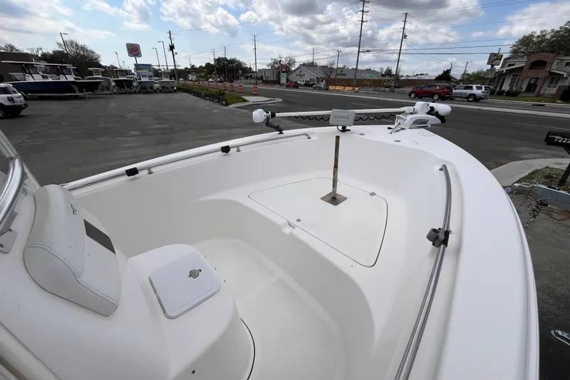 Slide: The Image of 2012 Tidewater 216 CC Adventure boat bow with seating and Garmin equipment. - 10