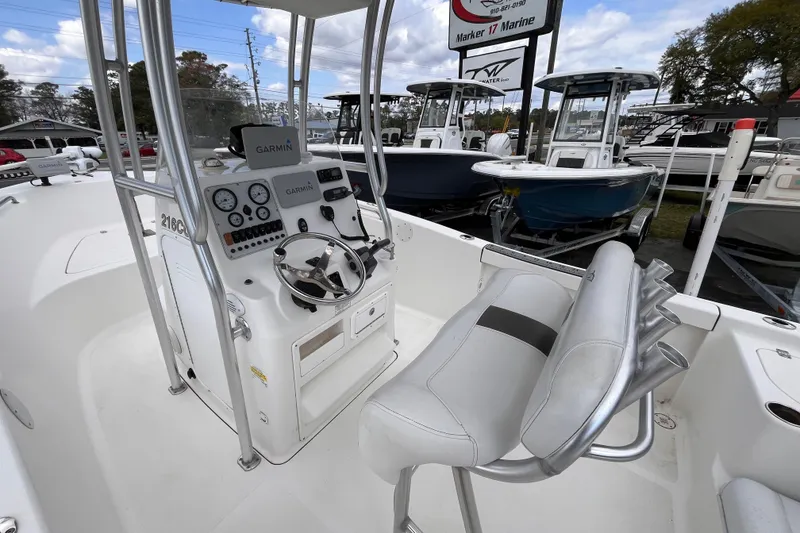 Slide: The Image of 2012 Tidewater 216 CC Adventure boat interior with Garmin navigation system. - 14