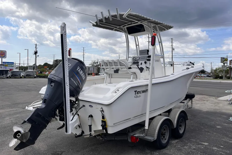 Slide: The Image of 2012 Tidewater 216 CC Adventure boat with Yamaha outboard motor on trailer. - 5