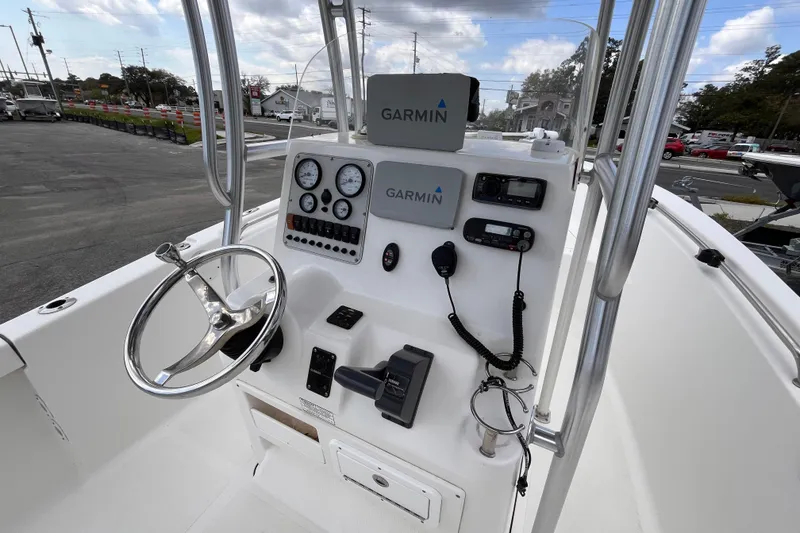 Slide: The Image of Control panel of a 2012 Tidewater 216 CC Adventure boat with Garmin navigation equipment. - 8