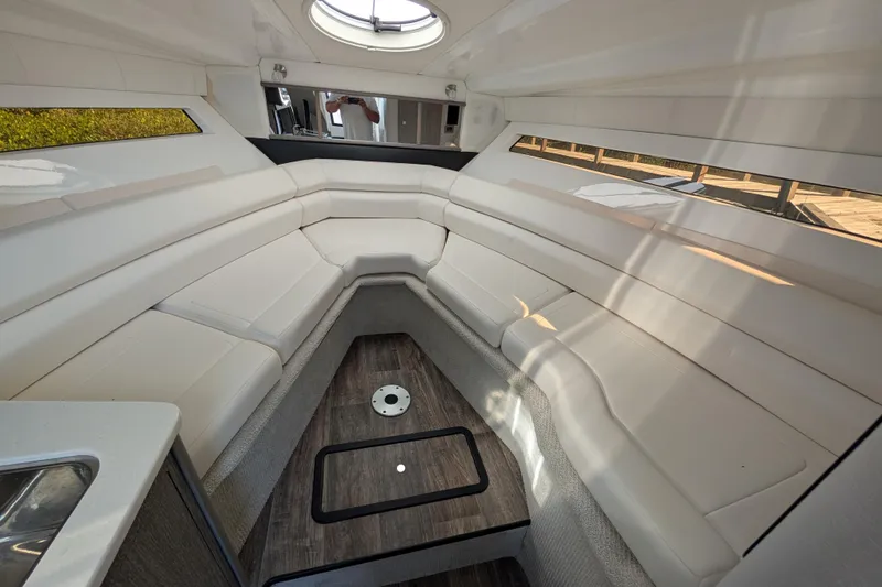 Slide: The Image of Luxurious interior of 2022 Monterey 295SS Super Sport boat with plush seating. - 17