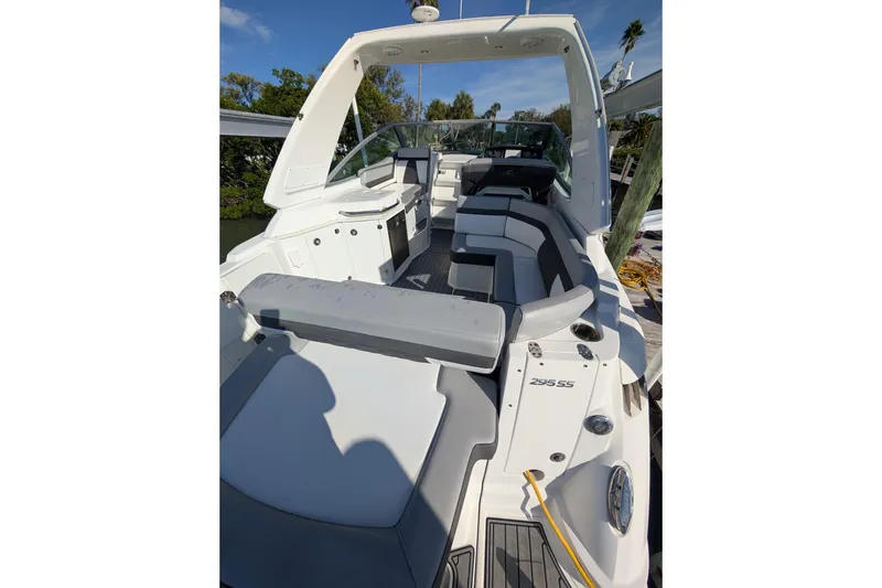 Slide: The Image of 2022 Monterey 295SS Super Sport boat with sleek seating and modern design. - 6