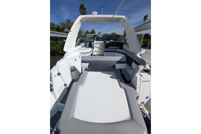 Slide: The Image of 2022 Monterey 295SS Super Sport boat interior with sleek seating and modern design. - 7