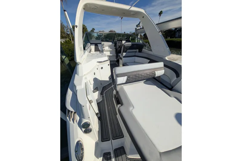 Slide: The Image of 2022 Monterey 295SS Super Sport boat interior with sleek seating and modern design. - 8