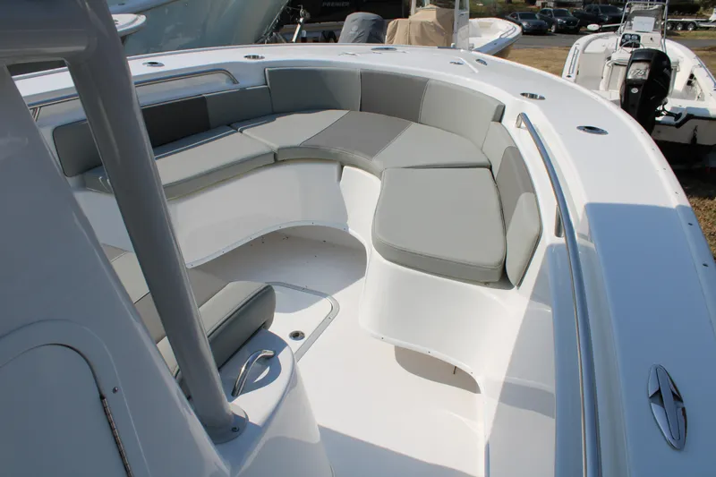 Slide: The Image of Interior view of 2026 Cape Horn 24 XS boat with gray seating. - 10