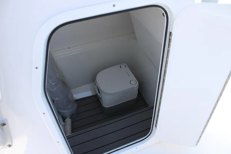 Slide: The Image of Interior of Cape Horn 24 XS 2026 with portable toilet. - 11