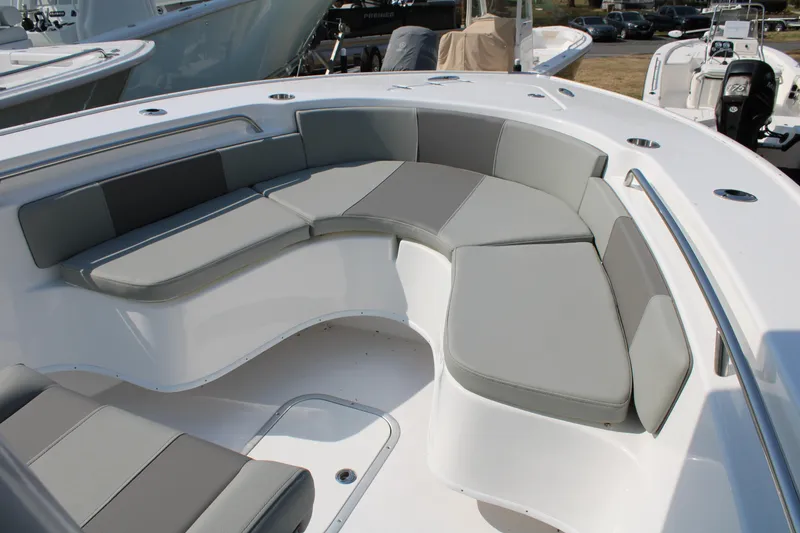 Slide: The Image of Interior view of 2026 Cape Horn 24 XS with gray cushions. - 12