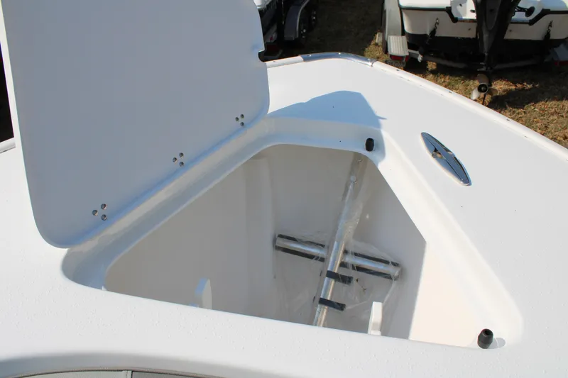 Slide: The Image of Open storage compartment on a 2026 Cape Horn 24 XS boat. - 15