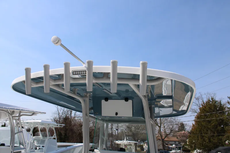 Slide: The Image of Cape Horn 24 XS 2026 boat top with fishing rod holders. - 16