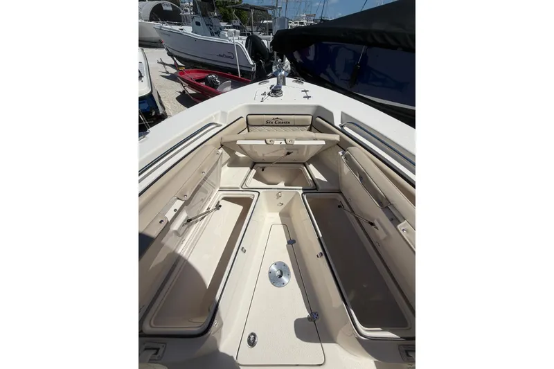 Slide: The Image of 2022 Sea Chaser 22 HFC boat interior with open storage compartments. - 14