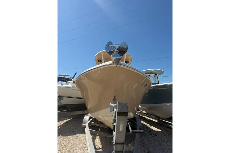 Slide: The Image of 2022 Sea Chaser 22 HFC boat on trailer under clear blue sky. - 3