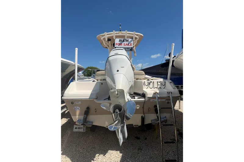 Slide: The Image of 2022 Sea Chaser 22 HFC boat for sale, rear view with motor and ladder. - 5
