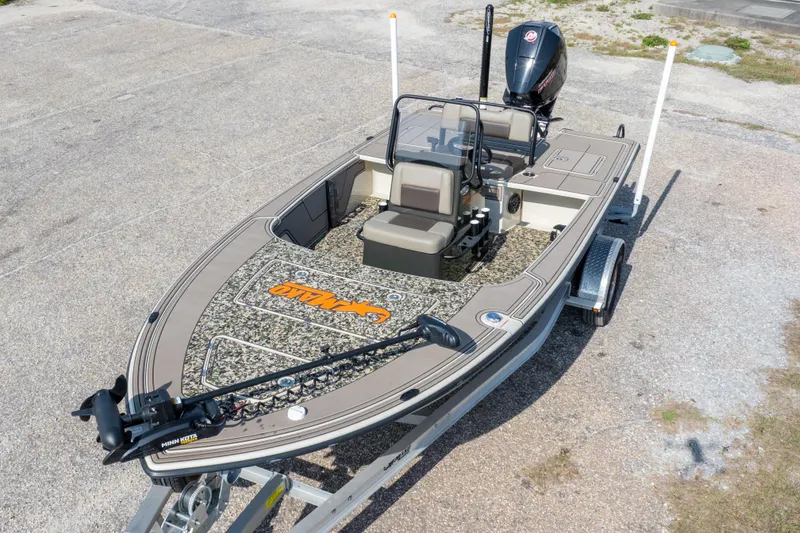 Slide: The Image of 2025 Mako 18 Pro Skiff Backwater Edition boat on trailer, top view. - 35