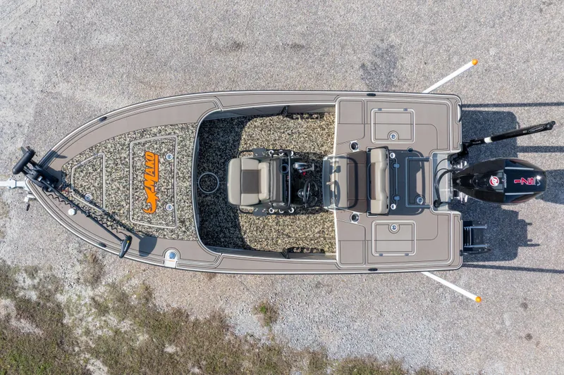 Slide: The Image of Top view of 2025 Mako 18 Pro Skiff Backwater Edition boat on gravel surface. - 38