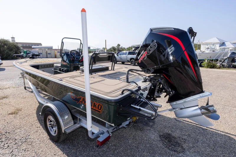 Slide: The Image of 2025 Mako 18 Pro Skiff Backwater Edition with powerful outboard motor. - 7