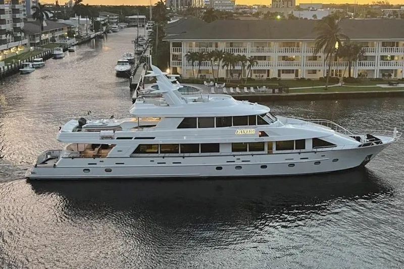 The Image of Luxury Crescent Custom Yacht from 2000 cruising in a scenic canal at sunset. - 0