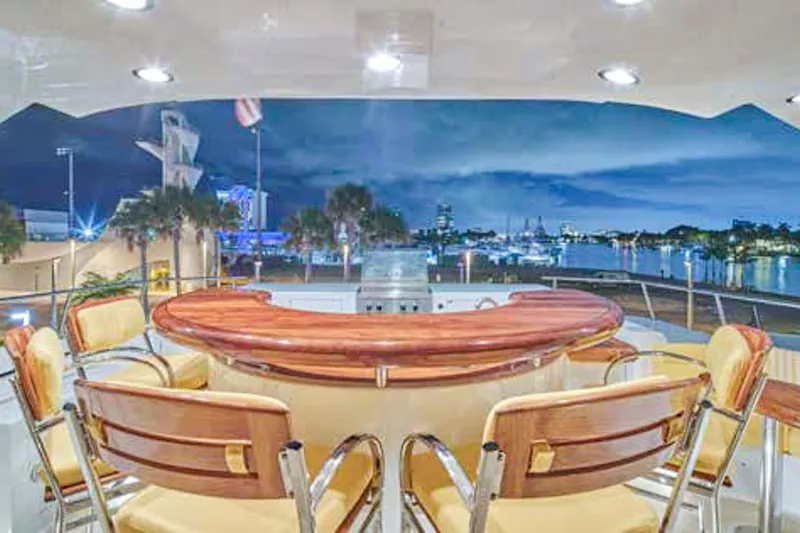 Slide: The Image of Luxurious yacht bathroom with wooden cabinetry, marble flooring, and glass shower, Crescent Custom Yachts 2000. - 16