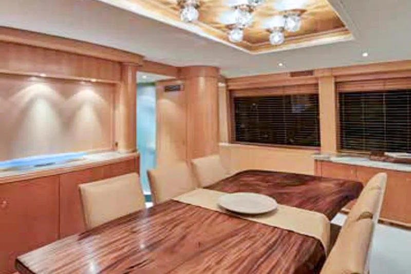 Slide: The Image of Luxurious yacht interior with plush seating, elegant decor, and ambient lighting, Crescent Custom Yachts 2000. - 3