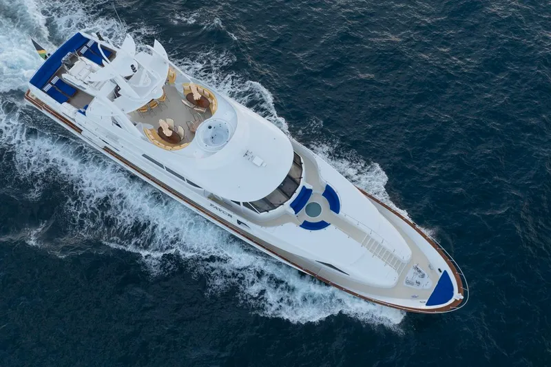 Slide: The Image of Aerial view of 2000 Crescent Custom Yachts cruising on open water. - 53