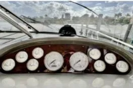 Slide: The Image of Dashboard of 2007 Regal Commodore 3760 IB boat with gauges and controls. - 10