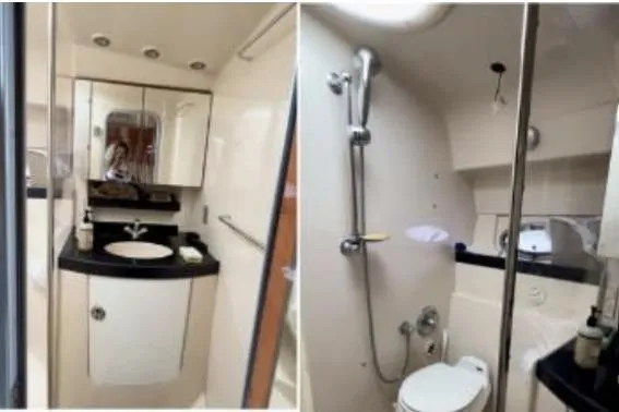 Slide: The Image of 2007 Regal Commodore 3760 IB yacht bathroom with sink, shower, and toilet. - 2