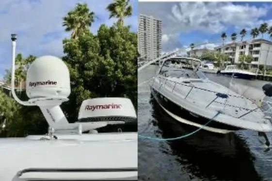 Slide: The Image of 2007 Regal Commodore 3760 IB yacht with Raymarine equipment, docked near palm trees and buildings. - 6
